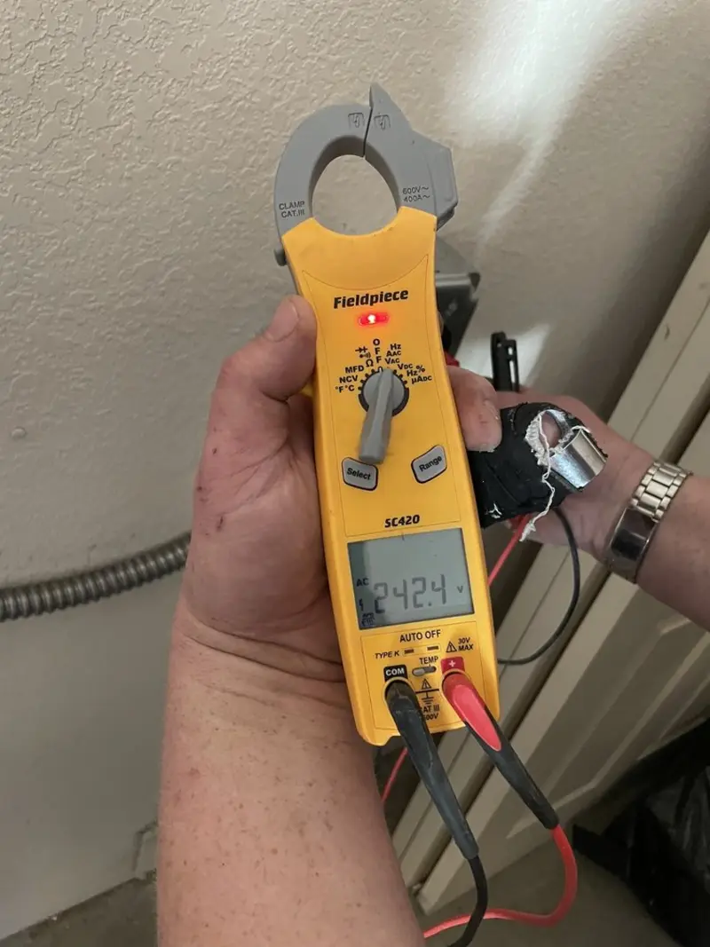 Voltage testing with clamp meter during Outlet Installation in Iron Mountain